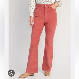 Pink corduroy high waisted flare pants.